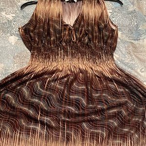 Long maxi brown with gold shimmers throughout design. Like new condition